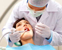 Woman receiving dental treatment