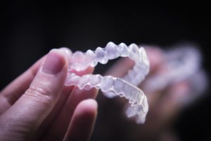 A pair of clear aligners.