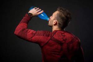 Man drinking a sports drink